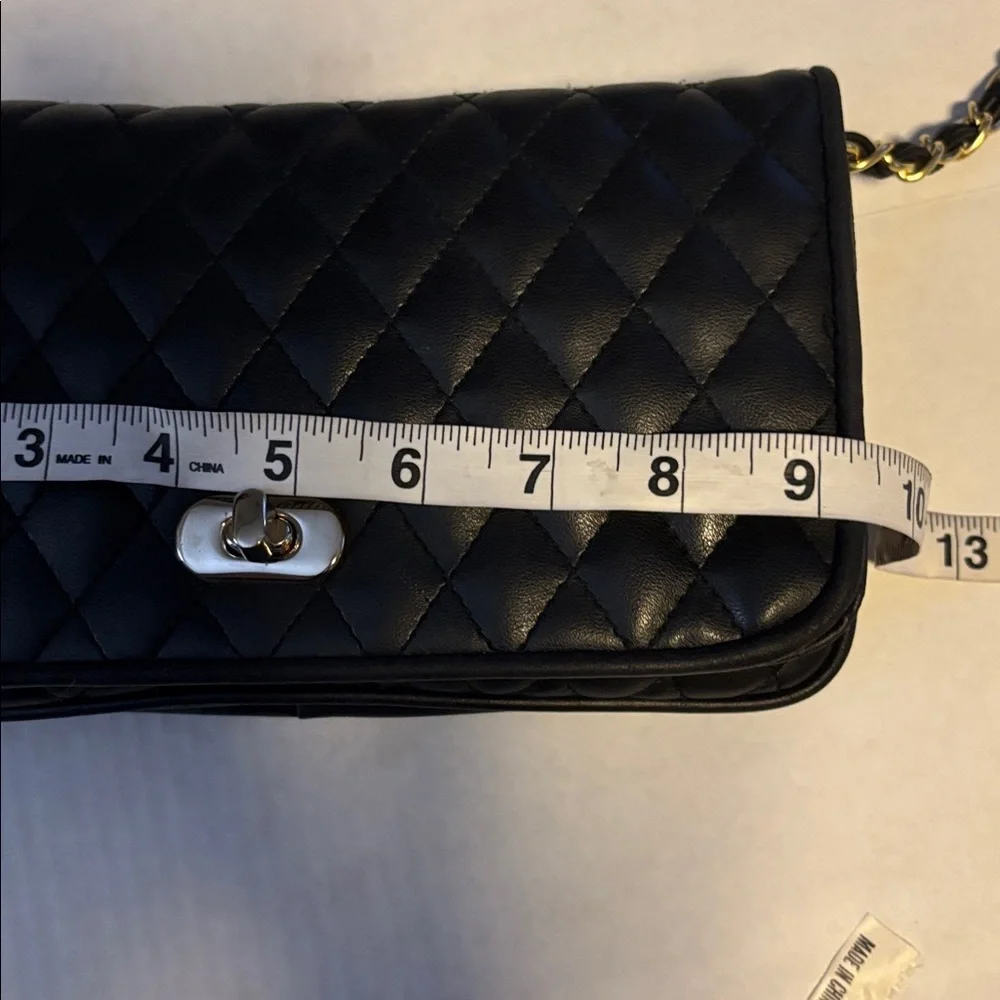EMPIRE-ORR.INC BRAND BLACK QUILTED FAUX LEATHER CROSSBODY GOLD AND BLACK STRAP